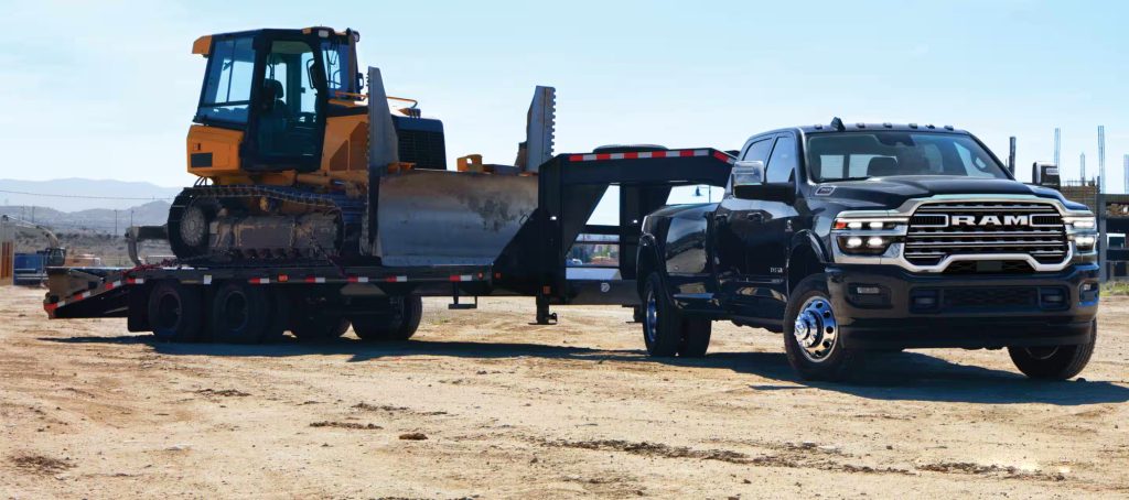 RAM truck hauling farm equipment
