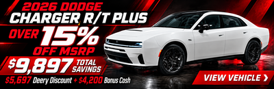White 2026 Dodge Charger R/T Plus with black roof, advertising 'Over 15% Off MSRP' and '$9,897 Total Savings' 