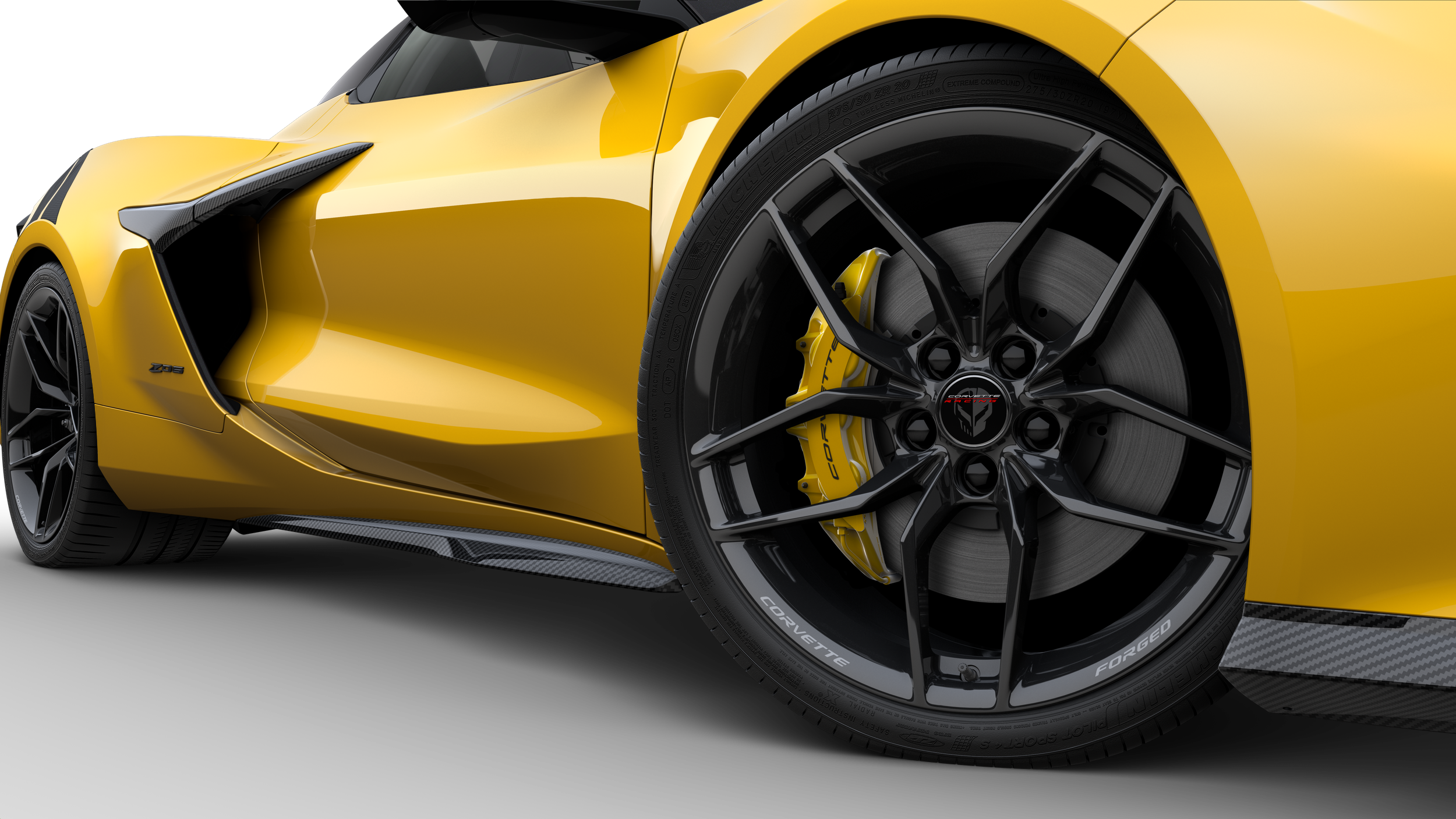 close up of the 10 spoke black wheels and yellow callipar on th 2025 Chevy Corvette Z06 for sale at Brad Deery Motors